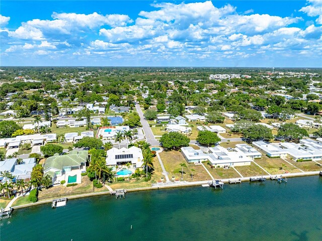 bird's eye view with a water view and a residential view