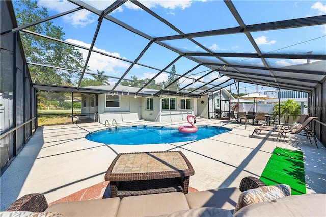 pool with glass enclosure, a patio, and outdoor lounge area