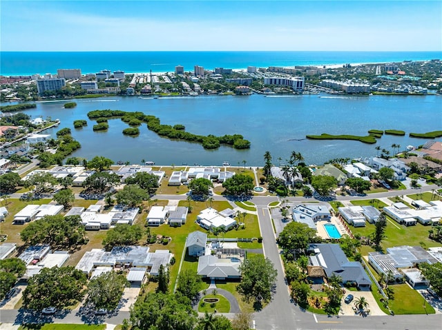 bird's eye view featuring a water view and a city view