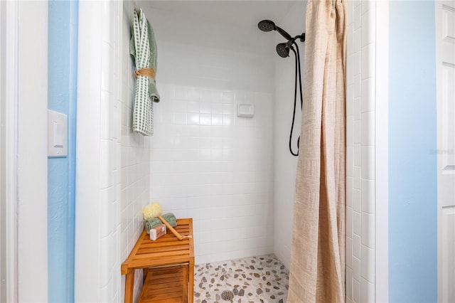 bathroom featuring a shower stall