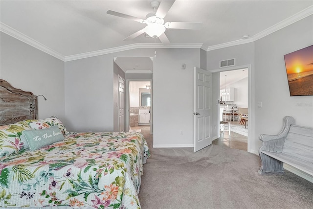 carpeted bedroom featuring ornamental molding, vaulted ceiling, ceiling fan, and ensuite bathroom