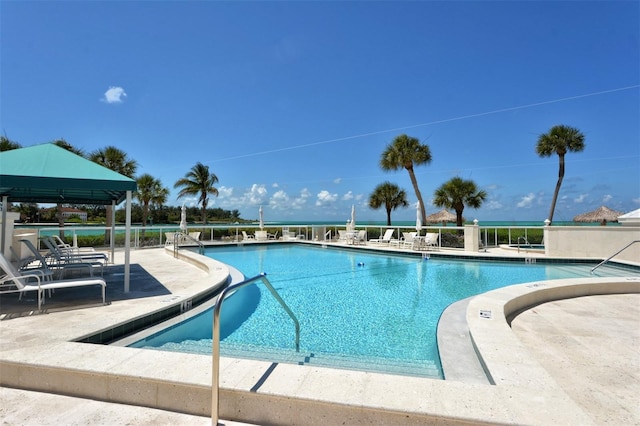 view of swimming pool featuring a patio area and a gazebo