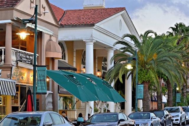 view of outdoor building at dusk