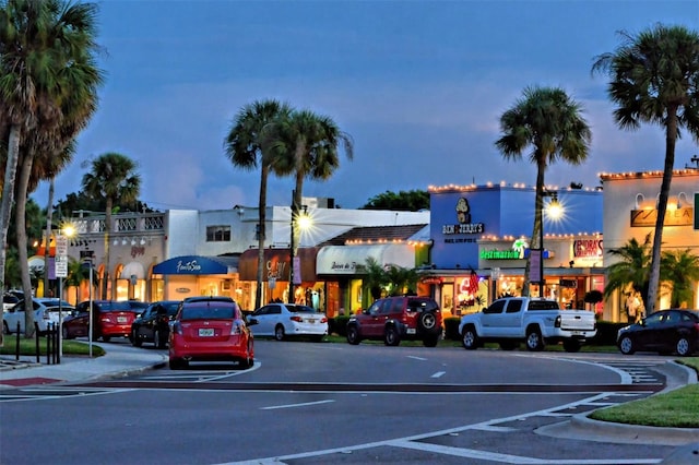 view of outdoor building at dusk