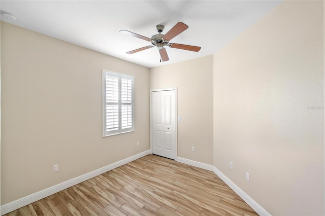 unfurnished room featuring ceiling fan and light hardwood / wood-style floors