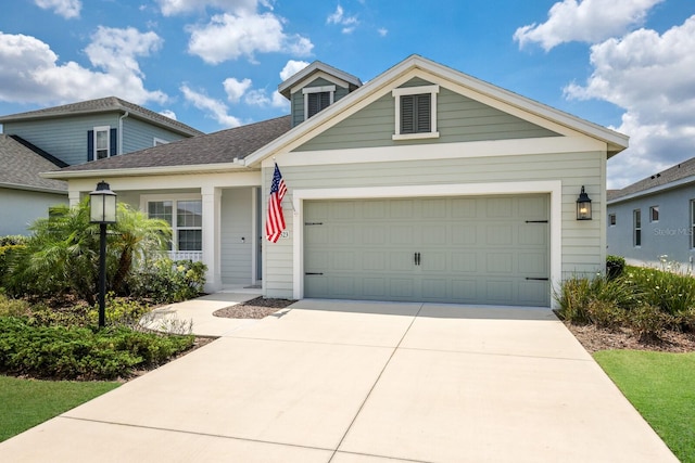 view of front of property featuring a garage