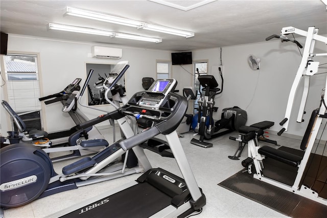 workout area with an AC wall unit