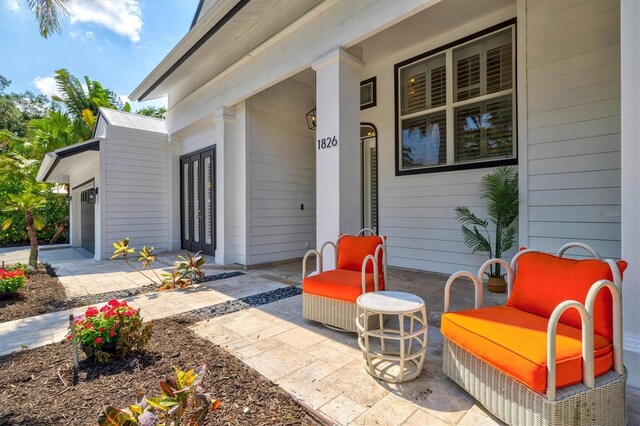 view of patio featuring a porch