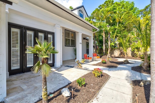 doorway to property with a porch