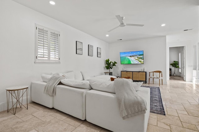 living room with ceiling fan