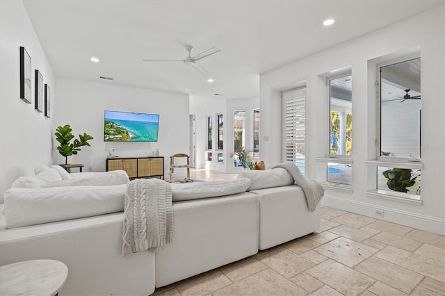 living room featuring ceiling fan