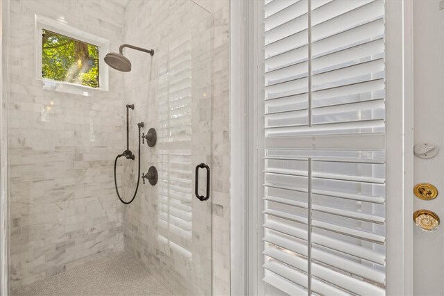 bathroom with an enclosed shower