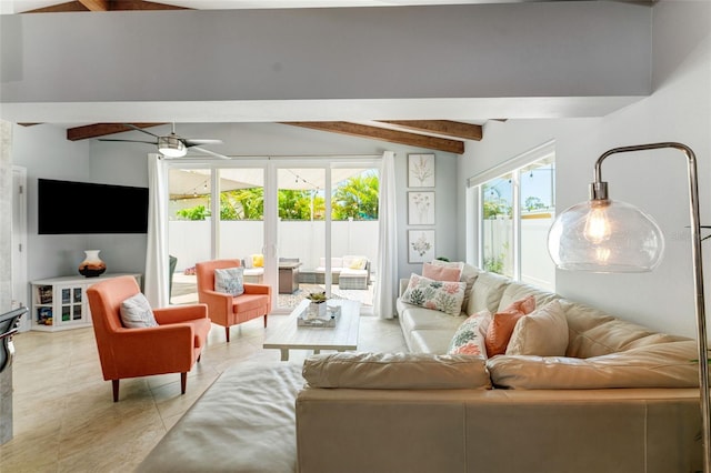 living room with ceiling fan and vaulted ceiling with beams