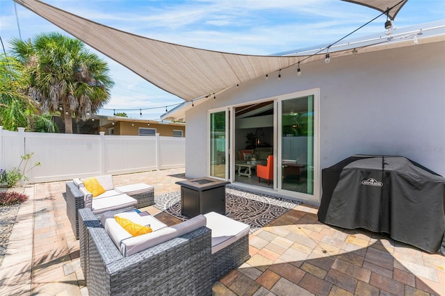 view of patio / terrace with grilling area and an outdoor hangout area