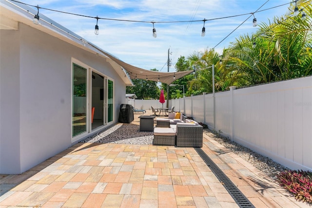 view of patio featuring area for grilling and outdoor lounge area