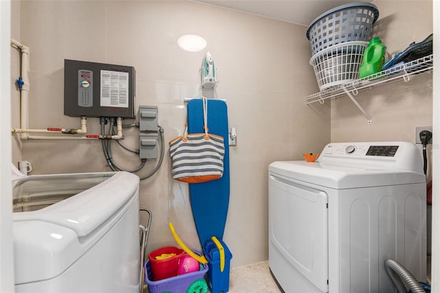 laundry area featuring washing machine and dryer