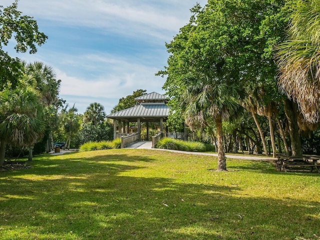 view of home's community featuring a gazebo and a yard