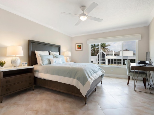 bedroom featuring ceiling fan and crown molding