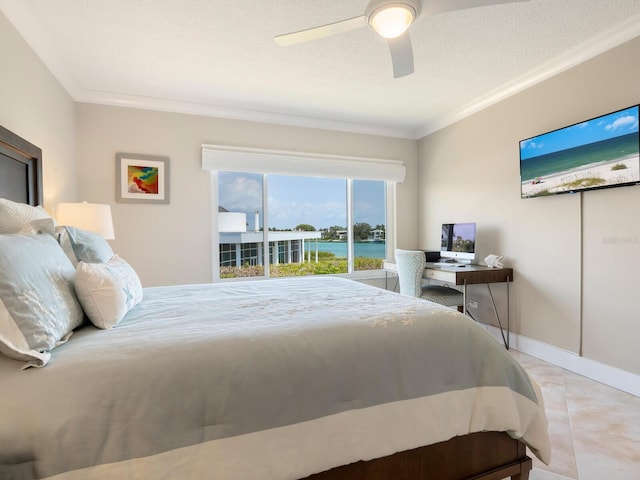 bedroom with ceiling fan, ornamental molding, and light tile patterned floors