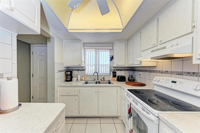 kitchen with ceiling fan, light tile floors, sink, white electric range oven, and backsplash