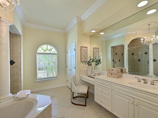 bathroom with independent shower and bath, vanity, ornate columns, and crown molding