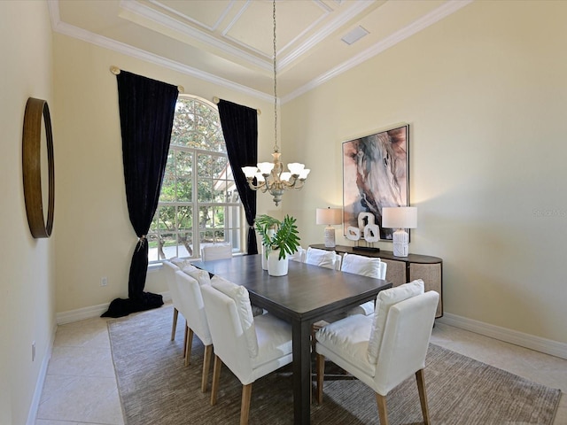 dining room with a chandelier, tile patterned flooring, and crown molding