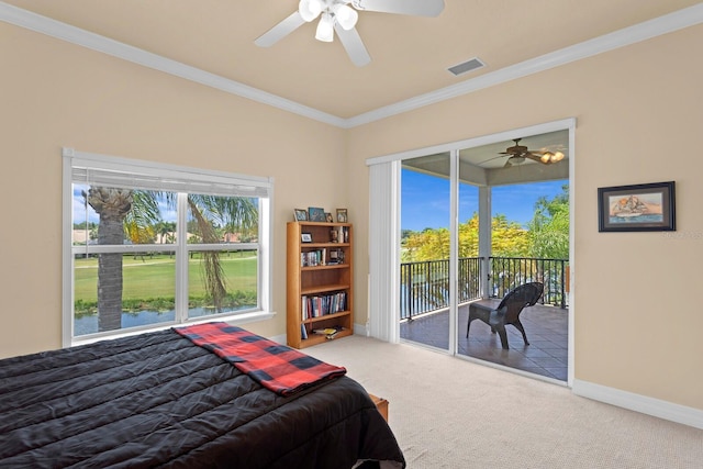 carpeted bedroom with access to exterior, ornamental molding, and ceiling fan