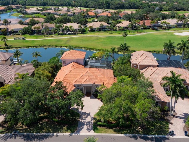 drone / aerial view with a water view