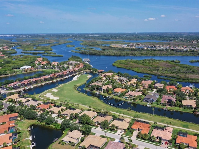 drone / aerial view with a water view