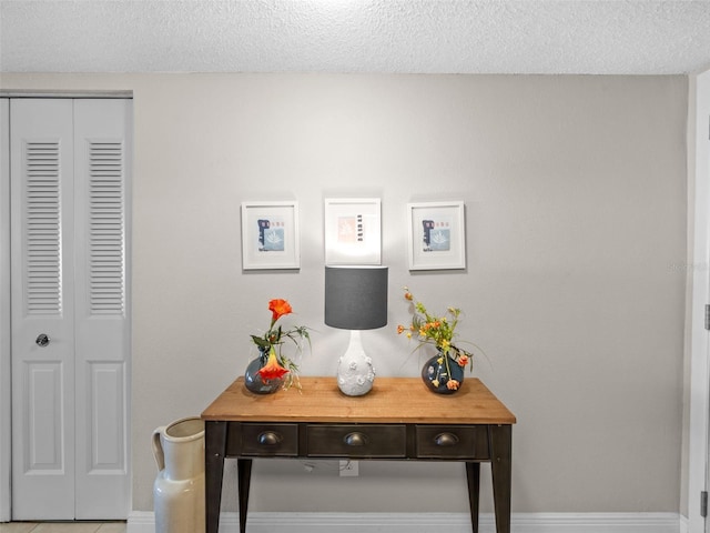 interior details with a textured ceiling