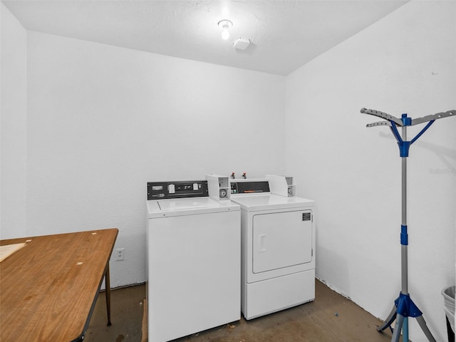 laundry room with washer hookup and washing machine and dryer