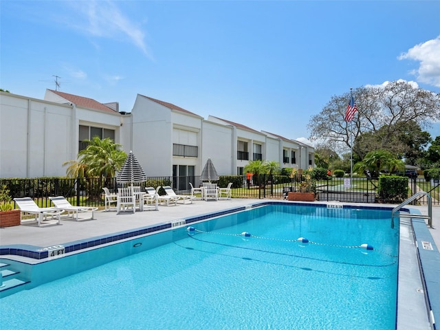 view of swimming pool with a patio