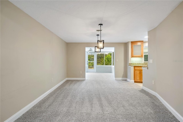 interior space featuring a chandelier