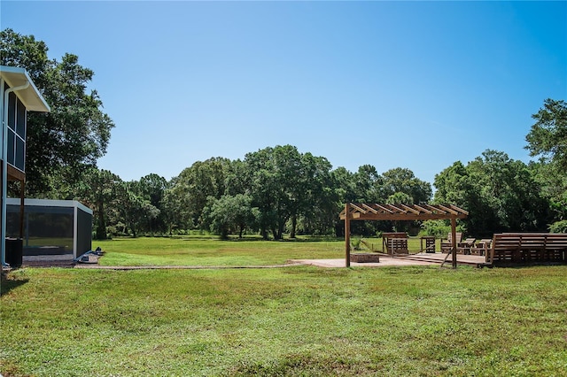 view of yard with a patio area and a pergola