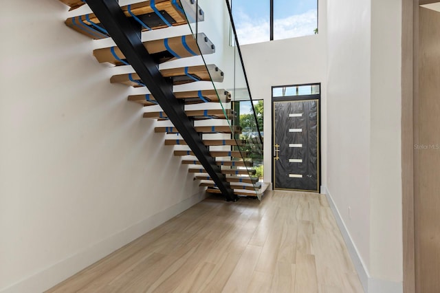 entryway with light hardwood / wood-style floors