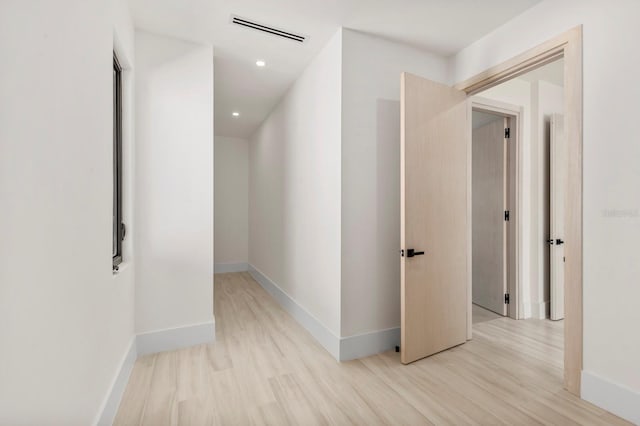 hallway featuring light hardwood / wood-style floors