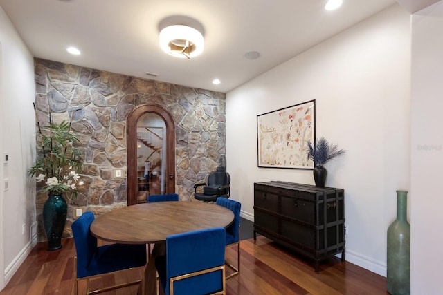 dining room with wood-type flooring