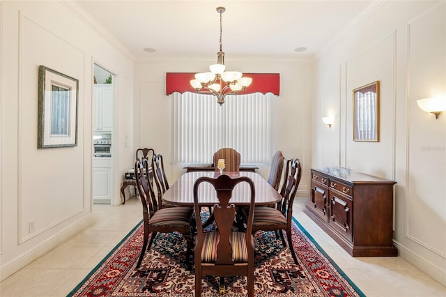 dining area featuring a notable chandelier, crown molding, and light tile floors