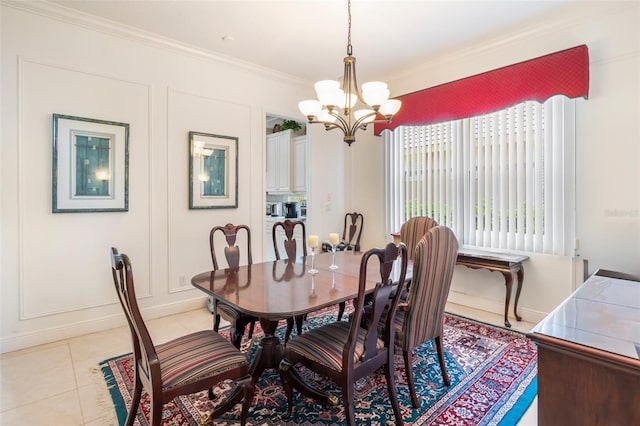 tiled dining area featuring an inviting chandelier and crown molding