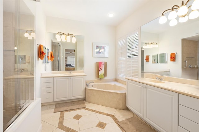 bathroom with independent shower and bath, dual bowl vanity, and tile flooring