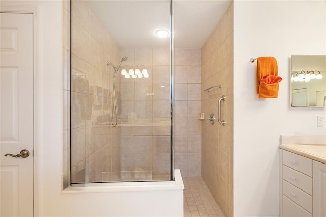 bathroom with vanity and an enclosed shower