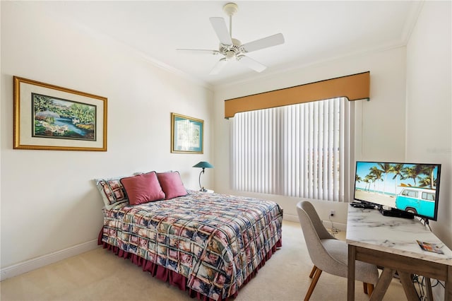 bedroom featuring ornamental molding, ceiling fan, and carpet flooring