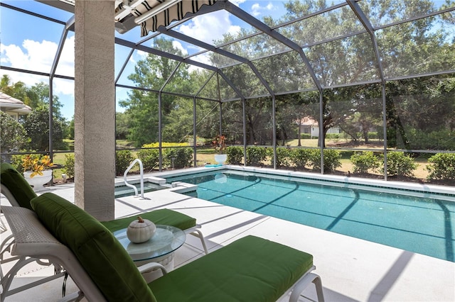 view of swimming pool with a patio and glass enclosure