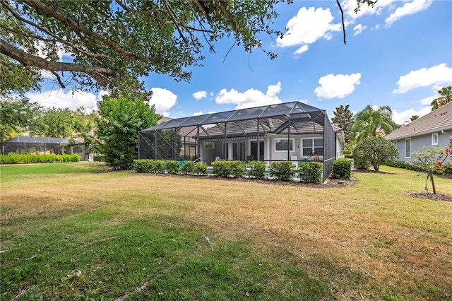 view of yard featuring glass enclosure