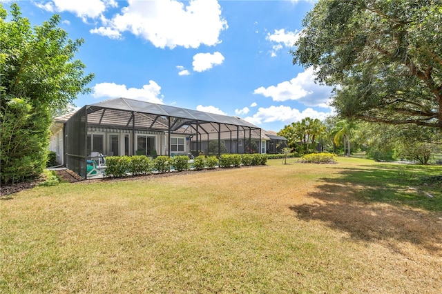 view of yard featuring glass enclosure