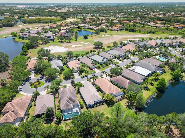 bird's eye view with a water view