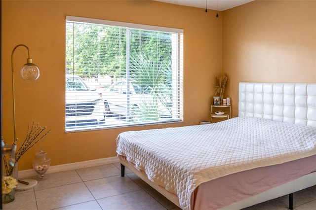 bedroom with tile patterned floors