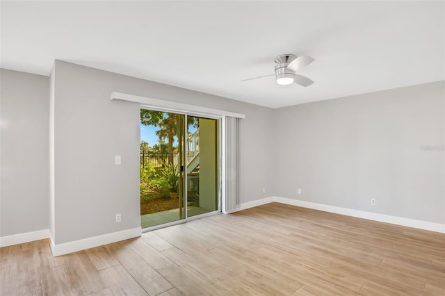 empty room featuring light hardwood / wood-style floors and ceiling fan