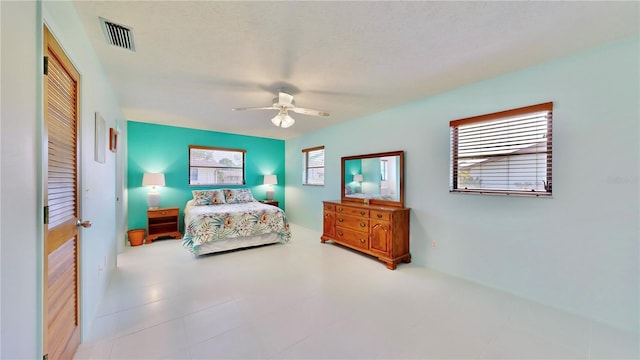 bedroom featuring ceiling fan