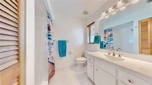 bathroom featuring tile patterned floors, walk in shower, vanity, and toilet